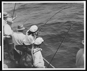 People fishing from a boat off San Clemente, ca.1930