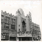 Exterior of Fox Oakland Theatre of Oakland, California with public auction notice on marquee