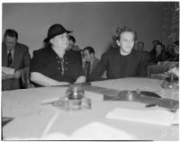 Deputy Sheriff Mary Talbot sits with Betty Flay Hardaker who was convicted of murdering her daughter, Los Angeles, 1940