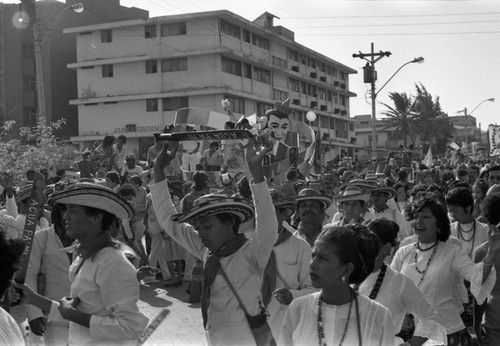 Dancers walking in the street Barranquilla, Colombia, 1977