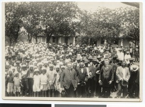 Gathering of people in front of a house, South Africa