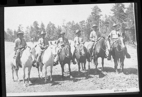 Copy photos, NPS Groups. Photo of rangers on horseback at some mountain meadow. Individuals unidentified