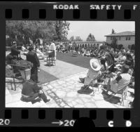 Bishop Juan Arzube conducting Cinco de Mayo Mass in courtyard of Mount St. Mary's College in Los Angeles, Calif., 1975