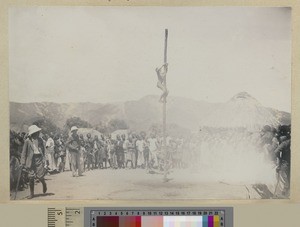 Greasy pole climbing, Livingstonia, Malawi, 1900