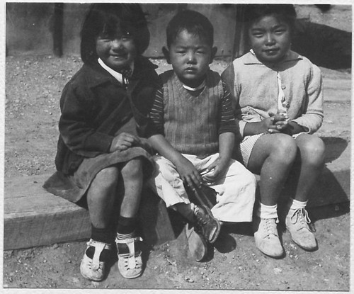 Three seated children