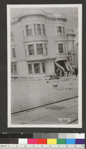 [Mission District building partially sunk. (Structure was atop site of former Lake McCoppin.) Nineteenth and Lapidge Sts.]