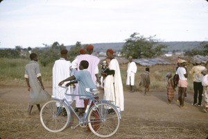 Boy with bicycle and others, Meiganga, Adamaoua, Cameroon, 1953-1968