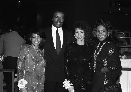 Jim Hill posing with Scherrie Payne, Freda Payne and Sheryl Lee Ralph, Los Angeles, 1989