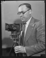 Louis J. Combe with Kodak camera panorama invention, Los Angeles, 1935