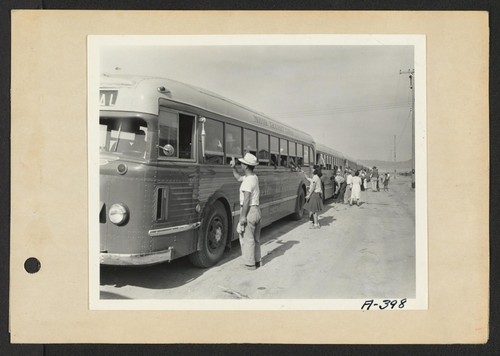 Poston, Ariz.--Buses bringing evacuees of Japanese ancestry to this War Relocation Authority center to spend the duration. Photographer: Clark, Fred Poston, Arizona