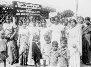Arcot, South India. Children and adults in front of Danish Mission English Nursery School at Ti