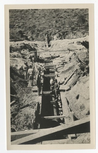 Construction of a trench for a steel pipeline on the San Diego flume following the 1916 flood