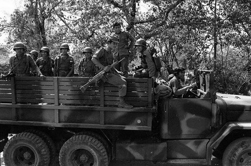 Army soldiers travelling on truck, Department of Cabañas, 1982