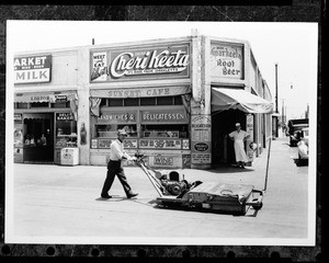 Sunset Café and a market on a street corner in Los Angeles, ca.1930-1949