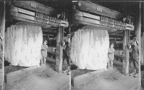 "Vermont, Marble being cut into thin slabs by smooth steel band saws, sand and water."