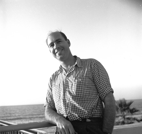 Sam Hinton, curator for the Museum Aquarium at Scripps Institution of Oceanography. Hinton was a marine biologist, artist, calligrapher and a popular folk singer. 1948