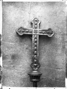 Detail on the reverse of a silver processional crucifix at Mission San Carlos, Monterey, ca.1905