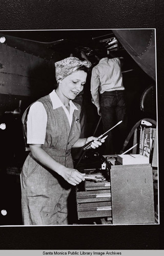 Douglas Aircraft Company Santa Monica plant employee with her toolbox, World War II