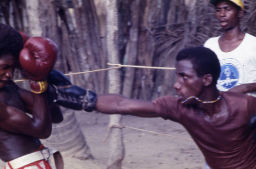 Boxers fighting inside ring, San Basilio de Palenque, 1976