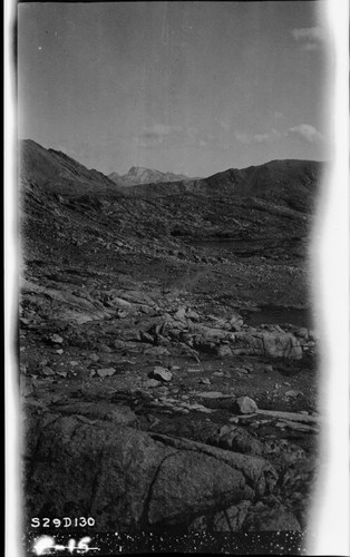 Trail routes, Alpine Fell-fields (Felsenmeer), looking southeast from a point just south of Mt. Ericson showing Mt. Whitney above ten miles by airline