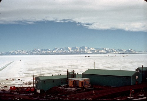 McMurdo Station, Ross Island, Antarctica, looking across frozen McMurdo Sound towards the Trans-Antarctic Mountains on the mainland. Airplane landing strip on sea ice