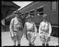 Marine Reserve officers Joseph P. Sproul, John J. Flynn, and O.E. Jensen at train station, 1933