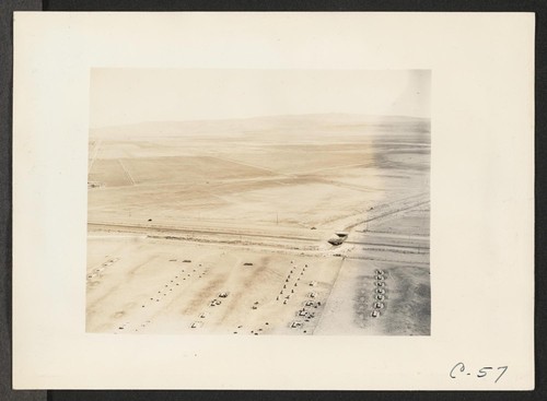 Tule Lake, Calif.--A panoramic view showing site of Tule Lake War Relocation Authority center. (See also nos. C-56, C-58, and C-59 for complete panorama.) Photographer: Albers, Clem Newell, California