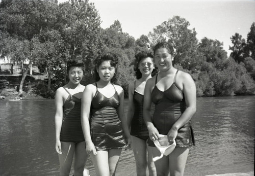 Four women at the river