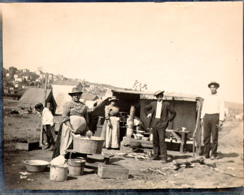 [Refugees washing their laundry at Gough and Green Street]