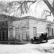 Post Office building with 1920s auto in front