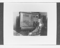 Tom Hoskins at the first telephone switchboard in Petaluma, California, 1884
