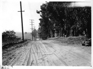 View looking east along El Camino Real from its intersection with Rosecrans Avenue, El Segundo, Los Angeles County, 1927