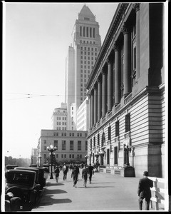 Exterior view of Los Angeles's old Federal Building and the new City Hall on the corner of Main Street and Temple Street