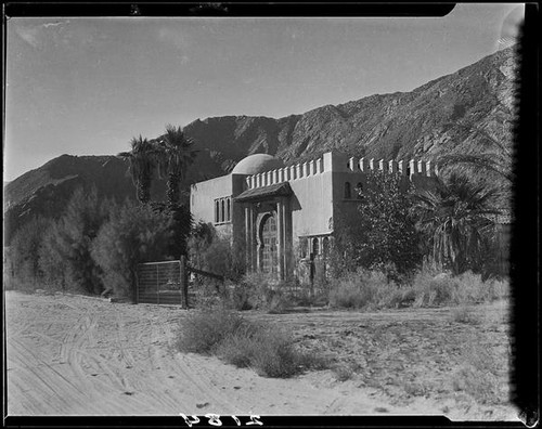 Villa Dar Marroc, the studio and home of painter Gordon Coutts, with crenelated roofline, dome, and horseshoe arches, Palm Springs, 1924-1937