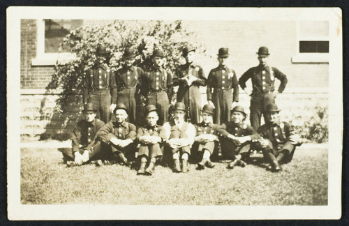 Early unidentified personnel in front of old Station No. 1