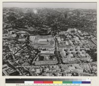 Los Angeles campus. The aerial photograph shows the amazing development since 1929. Left center are four large residence halls, while in the center is the 13,000-seat Pauley Pavilion. On the upper right are seen the concentrated buildings of the central campus, dominated at the upper tip by the high-rise Dickson Art Center and the Social Sciences Building. On the lower part is the interlocking complex of the Center for the Health Sciences