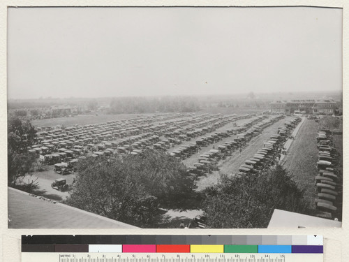 Davis campus. Davis Picnic Day in 1920 brought hundreds of alumni and friends to the campus. Parking was provided in fields now used as central campus. Building at right is West Hall, long used as a student residence hall