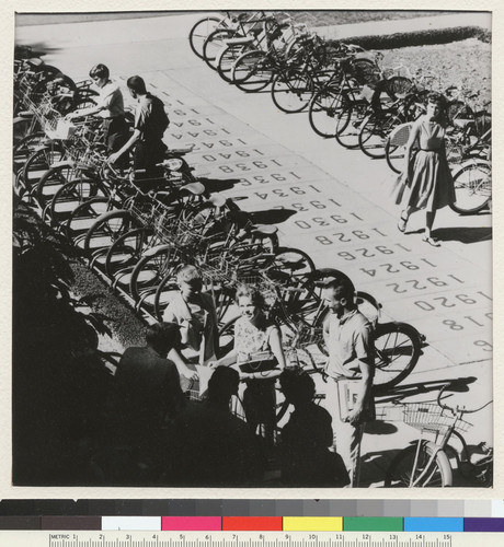 Davis campus. Bicycles provide traditional campus transportation. Library walkway contains time capsules placed by each graduating class since 1915