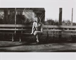Mary McGregor sitting on a bench, Santa Rosa, California, 1940