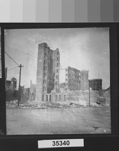 [Ruins of unidentified building. Flood Building at Powell, Eddy and Market Sts. in distance, right.]