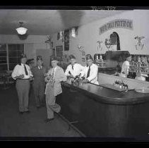 Ben Ali Shriners standing at a bar