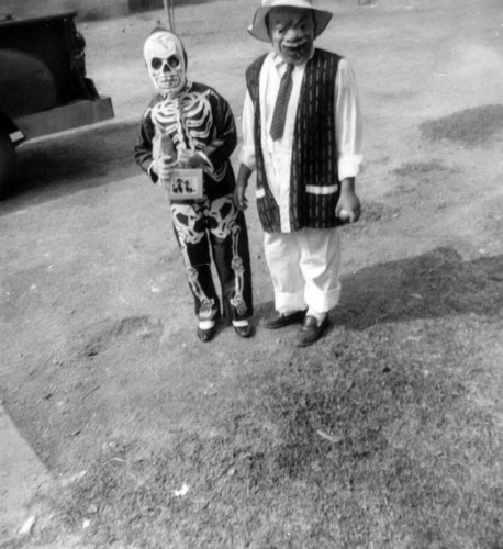 Boys in Halloween costumes