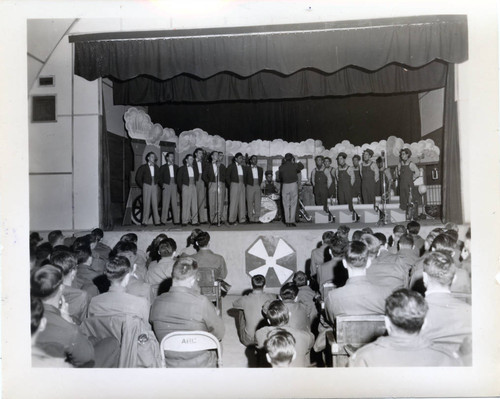 Chorus performance during an Eighth Army base musical review in Korea