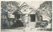 Helen Bernice Campin standing in front of her home, located at North 7th Street, San Jose, CA