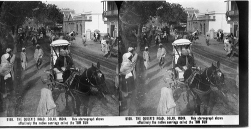 Inscribed in recto: 9169. THE QUEEN’S ROAD, DELHI, INDIA. This stereograph shows effectively the native carriage called the TUM TUM