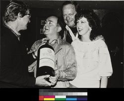 Jim Bundschu congratulates a Sonoma County Wineries Association Showcase & Auction winner, about 1980s
