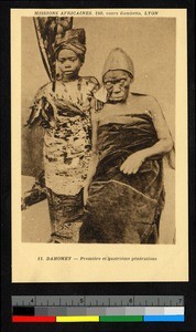 Woman standing beside elderly woman, Benin, ca.1920-1940