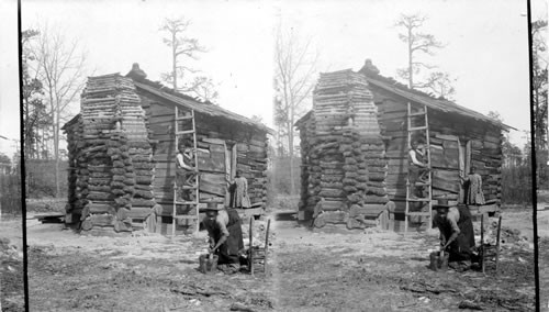 Typical log cabin with stick chimney. North Carolina