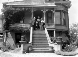 DaVall family on the steps of their home west of the intersection of 116 and Guerneville Road near Graton, California