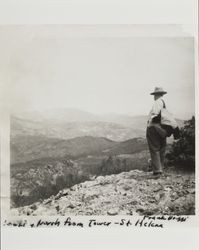 Frank Briggs looking at north view from Mount St. Helena, California, about 1940
